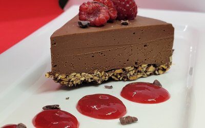 Chocolate Cheesecake With Salted Almond Crust And Raspberry Coulis
